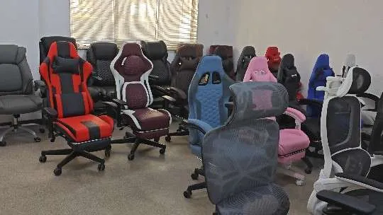 Wholesale Cheap Modern Leather Ergonomic Rotating Gaming Chair with Footrest for Racing and Office 